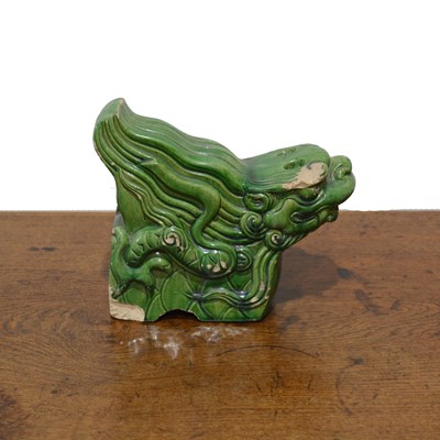 Lot 518 - Green-glazed tile figure Chinese in the form...