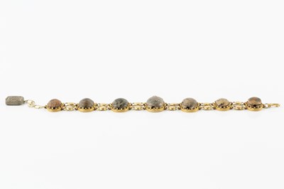 Lot 57 - A scarab bracelet, designed as a series of...