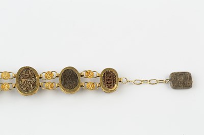 Lot 57 - A scarab bracelet, designed as a series of...