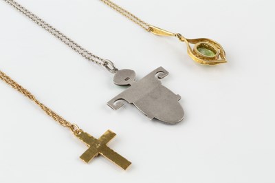 Lot 200 - A peridot and half pearl pendant, stamped '585'...