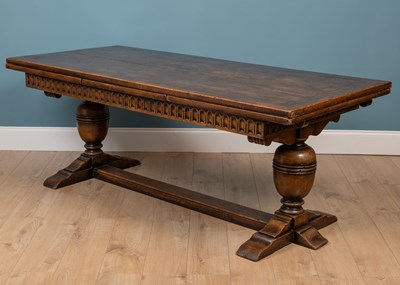 Lot 435 - A 17th century style oak draw leaf refectory or dining table