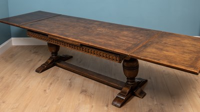 Lot 435 - A 17th century style oak draw leaf refectory or dining table