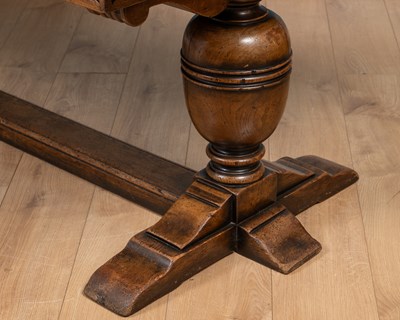 Lot 435 - A 17th century style oak draw leaf refectory or dining table
