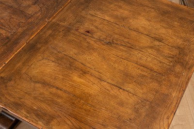 Lot 435 - A 17th century style oak draw leaf refectory or dining table