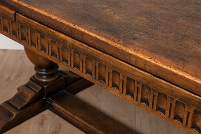 Lot 435 - A 17th century style oak draw leaf refectory or dining table