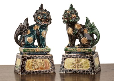 Lot 125 - Pair of polychrome models of temple dogs...