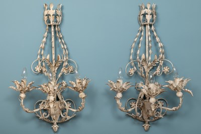 Lot 546 - A pair of white painted toleware three-branch wall lights