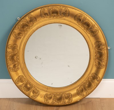 Lot 463 - A Regency style circular gilt framed wall mirror