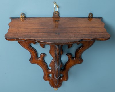 Lot 3 - A Victorian rosewood clock or wall bracket