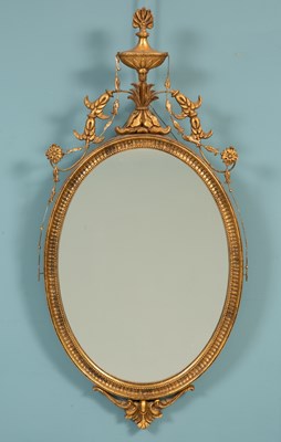 Lot 52 - A Neoclassical style oval wall mirror