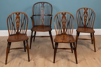 Lot 366 - A set of four fruitwood, ash and elm Windsor chairs