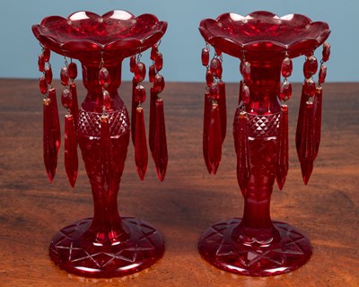 Lot 156 - A pair of ruby glass lustres