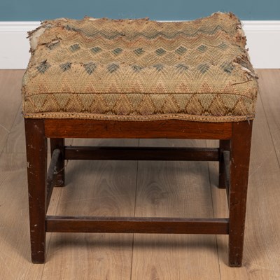 Lot 332 - An antique mahogany dressing stool