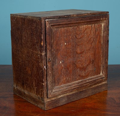 Lot 350 - A 17th or 18th century oak spice cabinet