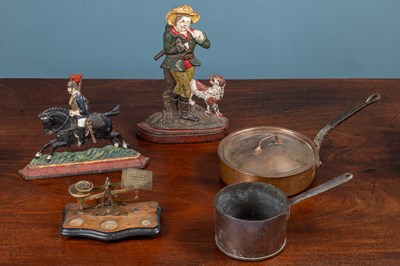 Lot 387 - A selection of miscellaneous items to include two cast iron doorstops