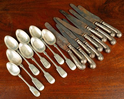 Lot 89 - Eleven pistol grip silver plate knives with filled handles by Elkington and Co.; together with seven fiddle pattern serving spoons and a dessert spoon