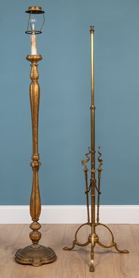 Lot 514 - A gilt carved wood lamp standard together with a Victorian brass lamp standard