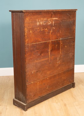 Lot 125 - A late 19th-century oak floor standing open bookcase