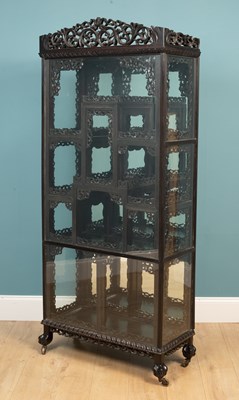 Lot 306 - A Chinese ebony display cabinet