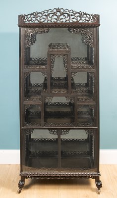 Lot 306 - A Chinese ebony display cabinet