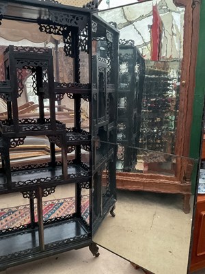 Lot 306 - A Chinese ebony display cabinet