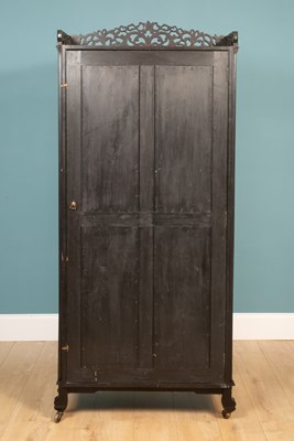 Lot 306 - A Chinese ebony display cabinet