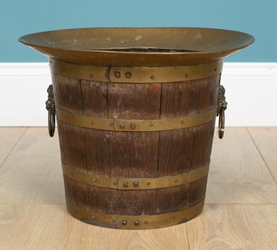 Lot 232 - An oak brass bound coopered bucket or jardinière