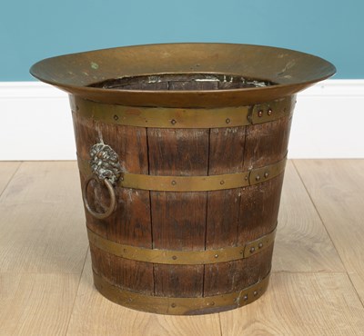 Lot 232 - An oak brass bound coopered bucket or jardinière