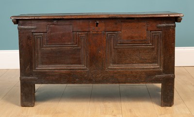 Lot 389 - An antique oak coffer