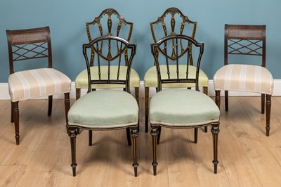 Lot 334 - A pair of ebonised and gilt Hepplewhite style chairs; together with two ebonised side chairs; and a pair of mahogany and wicker chairs