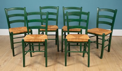 Lot 335 - A modern pine kitchen table with a single...