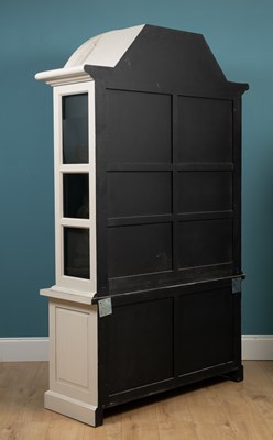 Lot 341 - A cream painted OKA display cabinet with an...