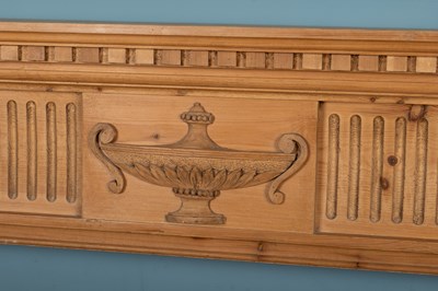 Lot 542 - A pine fire surround carved in the Adams style