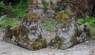 Lot 1279 - A pair of cast reconstituted stone recumbent lions