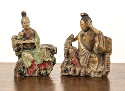 Lot 249 - Two carved and painted soapstone figures...