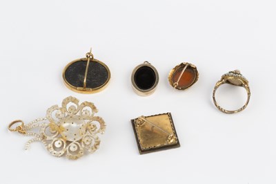Lot 34 - Two pietra dura panel brooches, each depicting...