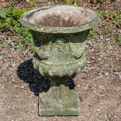 Lot 1366 - A cast reconstituted stone garden urn