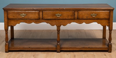 Lot 456 - A George III style oak dresser