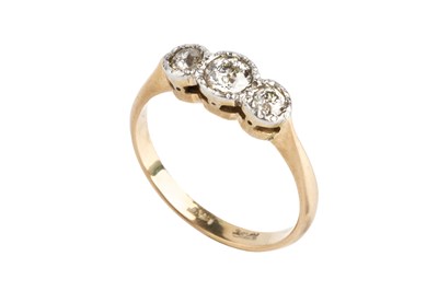 Lot 129 - A diamond three stone ring, the graduated...