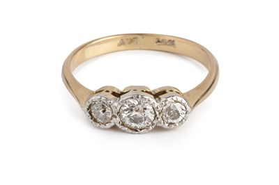 Lot 129 - A diamond three stone ring, the graduated...