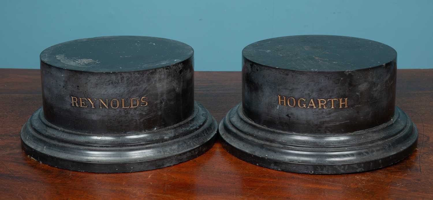 Lot 1321 - A pair of English turned black marble sculpture plinths