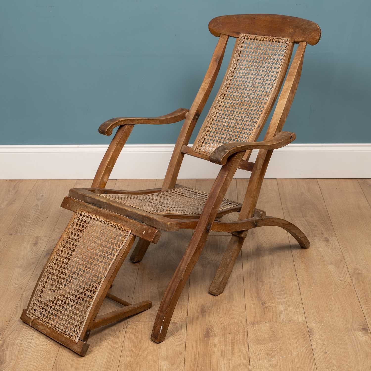 Lot 1219 An old wooden steamer type folding chair