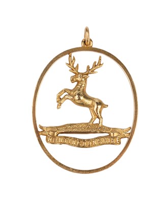 Lot 16 - A regimental pendant, depicting a rearing stag...