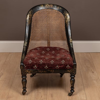 Lot 281 - A Victorian papier-mâché bergère chair