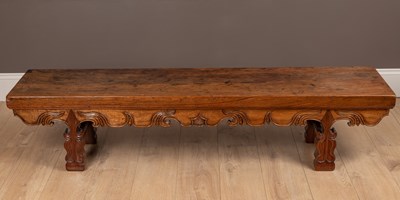 Lot 259 - A Chinese pitch pine and hardwood long lobed bench