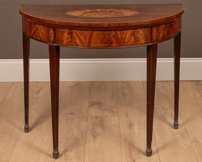 Lot 266 - A Georgian mahogany demi-lune card table