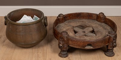 Lot 130 - An Indian carved wood log bin together with an Indian brass bowl