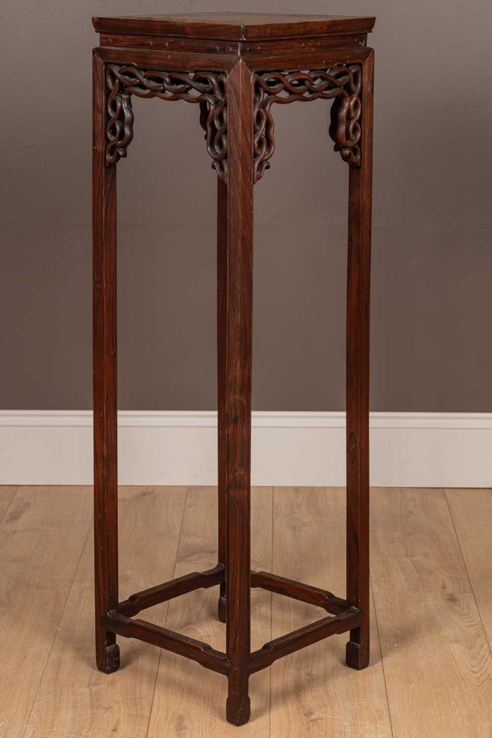 Lot 4 - A Chinese hardwood jardinière stand