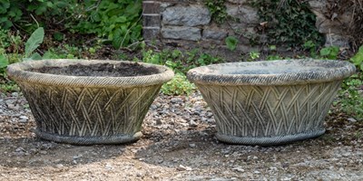 Lot 1195 - A pair of cast reconstituted stone oval planters