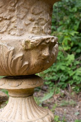 Lot 1342 - A pair of antique buff terracotta garden urns of classical form